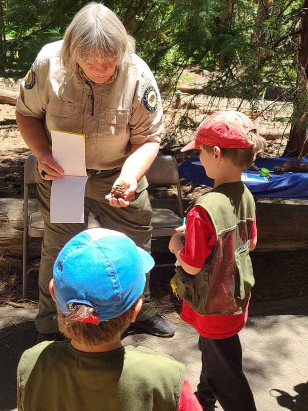 Staff talking to children. 